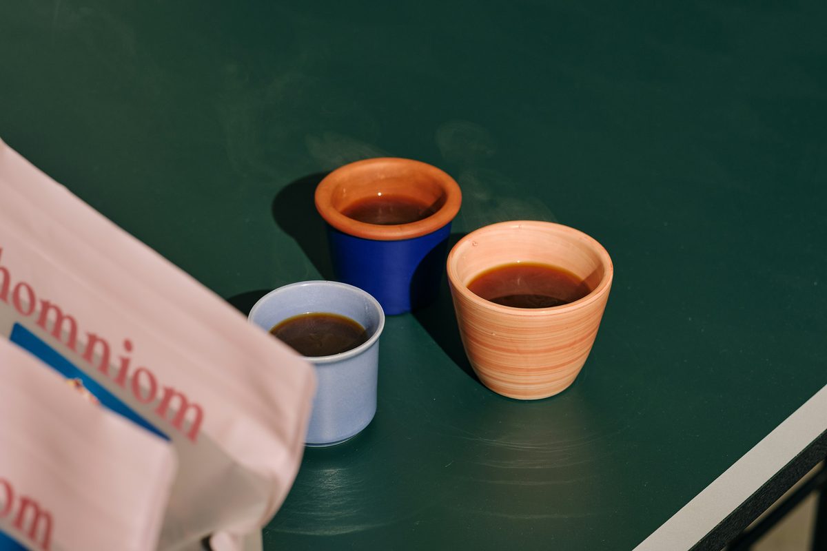 Coffee on Belly’s olive-green tables